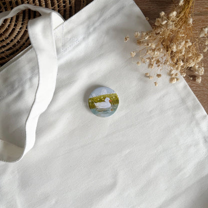 playful duckling button badge 44mm