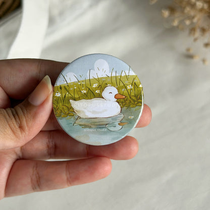 playful duckling button badge 44mm