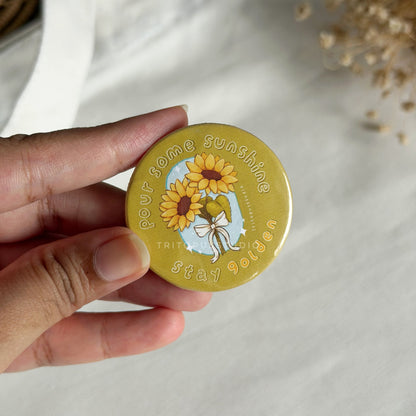 "stay golden" sunflower button badge 44mm
